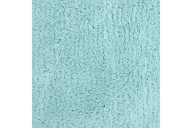 Create your own soothing spa-like experience with the Mohawk Blue Duo Bath Rug, available in size 1' 8"x2' 8". Durably designed with our machine tufted construction, this bath mat is crafted with stain resistant 100% nylon yarn and backed with the security of non-skid latex. Featuring a modern blue hue, this luxuriously soft bath rug will effortlessly add a cozy cushion of cloud-like comfort.Machine Tufted | Cut Pile | 100% Nylon | Made in the USA