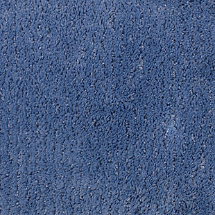 Create your own soothing spa-like experience with the Mohawk Aqua Duo Bath Rug, available in size 1' 8"x1' 10". Durably designed with our machine tufted construction, this bath mat is crafted with stain resistant 100% nylon yarn and backed with the security of non-skid latex. Featuring a modern aqua blue hue, this luxuriously soft bath rug will effortlessly add a cozy cushion of cloud-like comfort.Machine Tufted | Cut Pile | 100% Nylon | Made in the USA