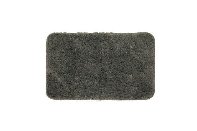 Create your own soothing spa-like experience with the Mohawk Light grey Duo Bath Rug, available in size 1' 8"x2' 8". Durably designed with our machine tufted construction, this bath mat is crafted with stain resistant 100% nylon yarn and backed with the security of non-skid latex. Featuring a modern light grey hue, this luxuriously soft bath rug will effortlessly add a cozy cushion of cloud-like comfort.Machine Tufted | Cut Pile | 100% Nylon | Made in the USA