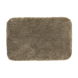 Create your own soothing spa-like experience with the Mohawk Taupe Duo Bath Rug, available in size 1' 8"x2' 8". Durably designed with our machine tufted construction, this bath mat is crafted with stain resistant 100% nylon yarn and backed with the security of non-skid latex. Featuring a modern tan hue, this luxuriously soft bath rug will effortlessly add a cozy cushion of cloud-like comfort.Machine Tufted | Cut Pile | 100% Nylon | Made in the USA