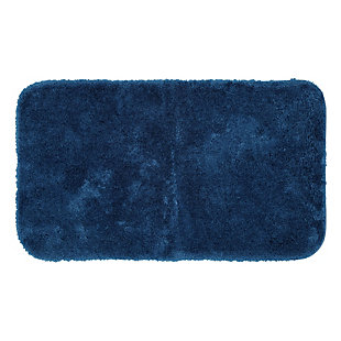 Create the ultimate oasis in your bath with the plush softness of the Riverside Bath Rug, available in dark aqua indigo blue. Machine tufted for quality and crafted with the irresistible comfort of premium moisture absorbent nylon yarn, the durable design of this bath rug will remain resilient despite daily use.Machine Tufted | Cut Pile | 100% Nylon | Made in the USA