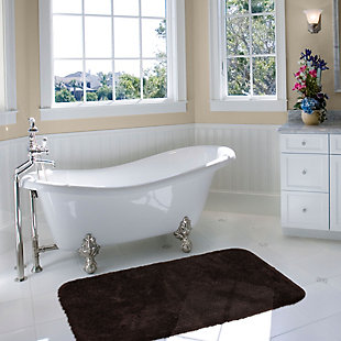 Create the ultimate oasis in your bath with the plush softness of the Riverside Bath Rug, available in velvety dark chocolate brown. Machine tufted for quality and crafted with the irresistible comfort of premium moisture absorbent nylon yarn, the durable design of this bath rug will remain resilient despite daily useMachine Tufted | Cut Pile | 100% Nylon | Made in the USA