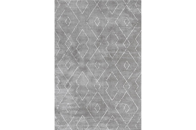 Sink into comfort with this modern shag. Boasting a wonderfully thick pile, each rug is machine made of polyester for a sumptuous feel underfoot. Having a sophisticated design makes this rug an ideal base for any contemporary decor.100% polyester | Hand tufted | Easy to clean and maintain | Unique hand crafted piece | Spot clean recommended | Imported