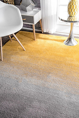 At nuLoom, we believe that floor coverings and art should not be mutually exclusive. Founded with a desire to break the rules of what is expected from an area rug, nuLoom was created to fill the void between brilliant design and affordability.100% polyester | Hand tufted | Easy to clean and maintain | Unique hand crafted piece | Spot clean recommended | Imported