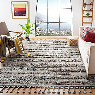 The Casablanca Collection of fine shag and flokati rugs displays the organic simplicity and classic style of traditional Moroccan rug weavers. These plush, luxurious area rugs are timeless yet contemporary. Casablanca is hand-tufted using the finest New Zealand wool to create the natural fleece tones and clean designs reminiscent of  the organic simplicity of Moroccan rug artistry. Construction: Hand Woven | Fiber Content: 100% Wool | Country of Origin: India