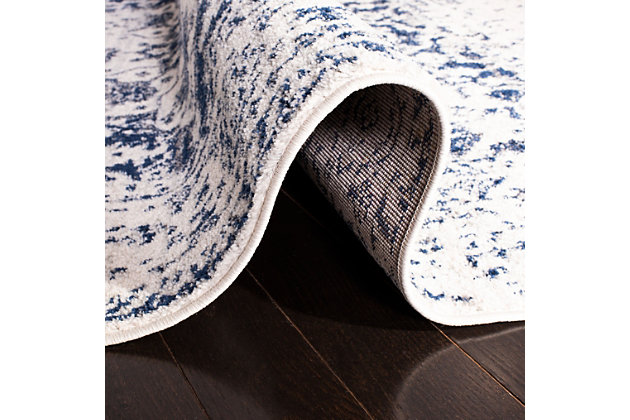 The heirloom elegance of yesteryear becomes chic, metro-mod décor in this contemporary styled, designer-look finish area rug. Traditional medallions and floral blooms, colored in décor-friendly navy and soft cream, are finished with a distressed, antique patina for a classic look that is all-together now. Power loomed using soft, easy-care synthetic yarns for long-lasting brilliance.Construction: power loomed | Fiber content: 65% polypropylene 21% jute 7% polyester 7% cotton | Country of origin: turkey