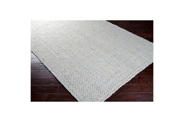 Wonderfully woven in a manner that radiates the impeccable artistry of hand made designs, the radiant rugs found within the jute woven collection by surya offer a flawless finishing touch to your space. Hand woven in 100% jute, these perfect pieces maintain not only the elements of timeless charm, but also, uphold qualities of natural, eco friendly design that make each truly incomparable within any room.Hand woven | For indoor/outdoor use | Uv resistant; water resistant | Reversible, minimal shedding | No backing, rug pad recommended | Pantone colors:  15-4003 | Spot clean only