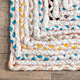 Brighten your room with this distinctively vivid rag rug. Hand crafted in India of recycled cotton strips, each piece carries with it a variation in color and pattern unique to the artisan who wove it. Because of the handmade nature of these rugs, no two will look exactly alike.100% cotton | Hand braided | Easy to clean and maintain | Unique hand crafted piece | Imported