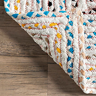 Brighten your room with this distinctively vivid rag rug. Hand crafted in India of recycled cotton strips, each piece carries with it a variation in color and pattern unique to the artisan who wove it. Because of the handmade nature of these rugs, no two will look exactly alike.100% cotton | Hand braided | Easy to clean and maintain | Unique hand crafted piece | Imported