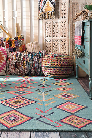 At nuLoom, we believe that floor coverings and art should not be mutually exclusive. Founded with a desire to break the rules of what is expected from an area rug, nuLoom was created to fill the void between brilliant design and affordability.70% wool, 30% viscose | Hand tufted | Easy to clean and maintain | Unique hand crafted piece | Imported