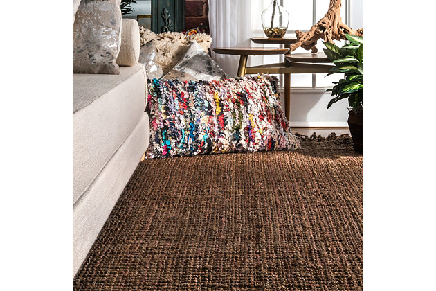 Sustainably hand-crafted of natural fibers, this rug boasts an organic simplicity to round out your home decor. Wood, brick or shiplap accents are all great ways to complement the earthy vibe of this rug.100% jute | Flatweave | Easy to clean and maintain | Unique hand crafted piece | Imported