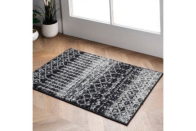The subtly distressed motif of this rug blends classic Moroccan style with functional comfort. This design is available in a wide array of colors to suit your aesthetic.100% polypropylene | Machine made | Easy to clean and maintain | Spot clean recommended | Imported