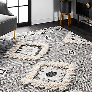 At nuLOOM, we believe that floor coverings and art should not be mutually exclusive. Founded with a desire to break the rules of what is expected from an area rug, nuLOOM was created to fill the void between brilliant design and affordability.100% Wool | Flatweave | Easy to clean and maintain | Spot clean recommended | Imported