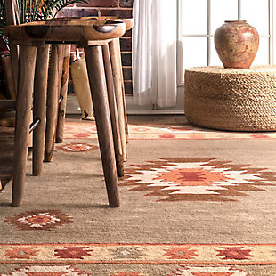 Dress up your wooden floors with this Southwestern rug. Hand crafted of 100% wool, the warm, muted colors of this style are well suited for modern and country decor enthusiasts alike. Play up the rustic element with plenty of plants, a faux elk head and bovine art pieces.100% Wool | Handt tufted | Easy to clean and maintain | Spot clean recommended | Imported