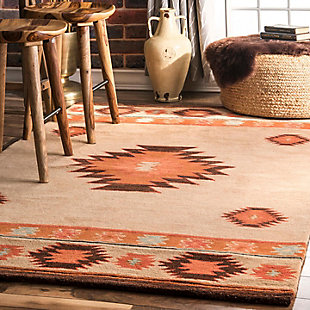 Dress up your wooden floors with this Southwestern rug. Hand crafted of 100% wool, the warm, muted colors of this style are well suited for modern and country decor enthusiasts alike. Play up the rustic element with plenty of plants, a faux elk head and bovine art pieces.100% Wool | Handt tufted | Easy to clean and maintain | Spot clean recommended | Imported