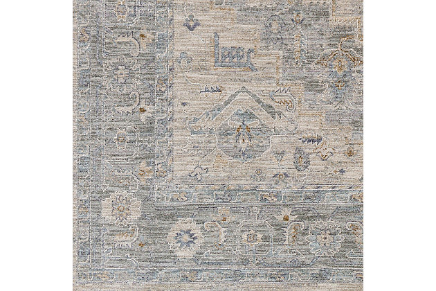 With a soft feel and stunning design, this rug is a conversation starter in any room. Its traditional pattern woven in beautiful colors features a high-low textured pile giving it depth and the subtle fringe detail only adds to the high end vintage feel. Woven in Turkey with polyester, this piece will offer glamour and luxury to your floors.Machine Woven | 90% Polyester, 10% Polypropylene | Fringe Detail | Easy Care | Imported
