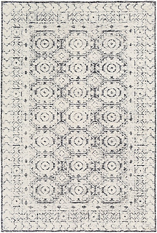 Hand tufted by artisans with 100% wool, this piece is impeccably crafted and it's handmade charm is sure to impress. With beautiful neutral colors coming together to form a pattern that can adapt to a variety of decor, this durable rug will be the perfect option whether you're style is traditional, boho, vintage, glam or modern.Hand Tufted | 100% Wool | High/Low Textured Pile | Medium Pile | Imported
