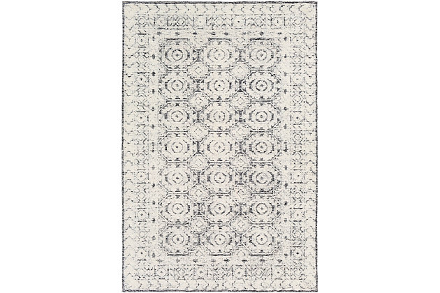 Hand tufted by artisans with 100% wool, this piece is impeccably crafted and it's handmade charm is sure to impress. With beautiful neutral colors coming together to form a pattern that can adapt to a variety of decor, this durable rug will be the perfect option whether you're style is traditional, boho, vintage, glam or modern.Hand Tufted | 100% Wool | High/Low Textured Pile | Medium Pile | Imported