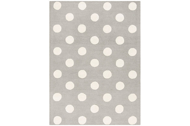 Polka-dots are the classic that just keeps on giving. This timeless Safavieh kids wool rug completes your child’s room with a textured gray and ivory pattern. It gives just the right amount of underfoot style, leaving you room to get as wildly creative as you please.Made of wool | Hand-tufted | Rug pad recommended | Wool fibers are prone to shedding, vacuum regularly and shedding will subside | Imported | Spot clean/dry clean recommended