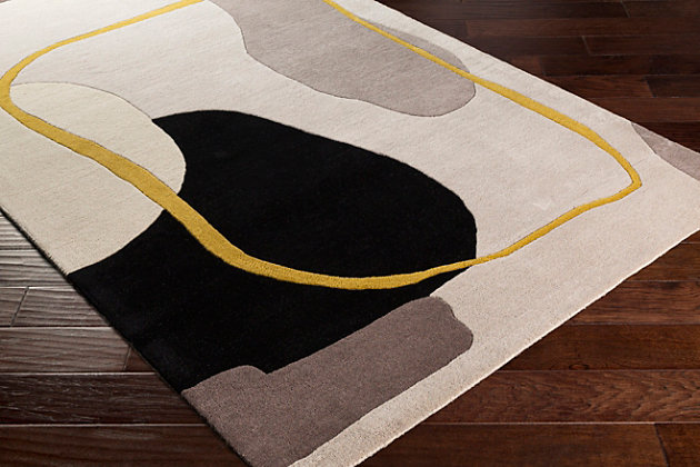 With its bold, abstract pattern woven with modern colors, this rug is the perfect on trend update for any space. Hand Tufted in India with 100% wool, it features a hand carved, high-low texture that adds drama and depth while offering a unique flair. This contemporary piece is sure to be the standout piece in any room. Hand Tufted | 100% Wool | Hand Carved | Minimal Shedding | Imported