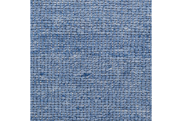 This minimalist, yet compelling, rug effortlessly perfects simplistic style with a twist. Hand woven in India with a blend of wool, cotton and polyester, this piece boasts durability and has a braided texture that forms a subtle, tonal pattern bringing a beautiful depth to your space. You can not go wrong with this modern take on solid classic style. Hand Woven | 60% Wool, 20% Cotton, 20% Polyester,  | No Pile | Minimal Shedding | Imported