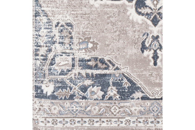 With a soft feel and stunning colors, this rug is sure to be the impressive centerpiece in any room. Its traditional oriental inspired pattern is washed just enough to give it a high end feel. Woven in Turkey with polypropylene, this durable piece will offer glamour and luxury to your floors.Machine Woven | 100% Polypropylene | Easy Care | Medium Pile | Imported
