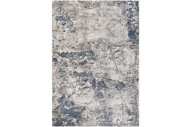 The cool tones of this piece blend perfectly together into a stunning pattern and the unique high-low textured pile brings luxurious, yet affordable, style to your floors. Turkish made and utilizing a blend of polyester and polypropylene for added softness, the grandiose design will instantly become the centerpiece of the room. Maintaining a flawless fusion of style and durability, this piece is a prime example of impeccable artistry and design. Machine Woven | 71% Polypropylene, 29% Polyester | High/Low Textured Pile | Easy Care | Imported