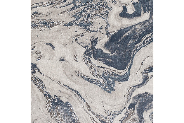 The cool tones of this piece blend perfectly together into a stunning pattern and the unique high-low textured pile brings luxurious, yet affordable, style to your floors. Turkish made and utilizing a blend of polyester and polypropylene for added softness, the grandiose design will instantly become the centerpiece of the room. Maintaining a flawless fusion of style and durability, this piece is a prime example of impeccable artistry and design. Machine Woven | 88% Polypropylene, 12% Polyester | High/Low Textured Pile | Easy Care | Imported