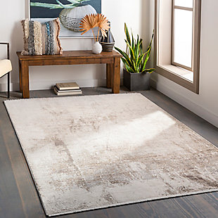 With a soft feel and stunning design, this rug instantly becomes the highlight of any room. Its modern pattern, woven together by beautiful neutral colors, features a high-low textured pile giving it depth and the subtle fringe detail only adds to the high end feel. Woven in Turkey with a blend of polypropylene and polyester, this durable piece will offer glamour and luxury to your floors.Machine Woven | 80% Polyester, 20% Polypropylene | Fringe Detail | Easy Care | Imported