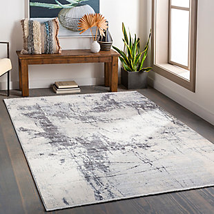 With a soft feel and stunning design, this rug instantly becomes the highlight of any room. Its modern pattern, woven together by beautiful neutral colors, features a high-low textured pile giving it depth and the subtle fringe detail only adds to the high end feel. Woven in Turkey with a blend of polypropylene and polyester, this durable piece will offer glamour and luxury to your floors.Machine Woven | 80% Polyester, 20% Polypropylene | Fringe Detail | Easy Care | Imported