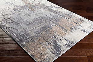 With a soft feel and stunning design, this rug instantly becomes the highlight of any room. Its modern pattern, woven together by beautiful neutral colors, features a high-low textured pile giving it depth and the subtle fringe detail only adds to the high end feel. Woven in Turkey with a blend of polypropylene and polyester, this durable piece will offer glamour and luxury to your floors.Machine Woven | 80% Polyester, 20% Polypropylene | High/Low Textured Pile | Easy Care | Imported