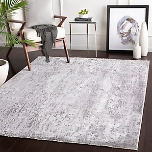 With a soft feel and stunning design, this rug instantly becomes the highlight of any room. Its traditional oriental inspired pattern, woven together by beautiful colors, features a high-low textured pile giving it depth. A lustrous sheen provides a bit of sparkle and the finishing touch of a fringe accent perfectly adds to the high end feel. Woven in Turkey with a blend of viscose and polyester, this durable piece will offer glamour and luxury to your floors.Machine Woven | 80% Viscose, 20% Polyester | High/Low Textured Pile | Fringe Detail | Imported