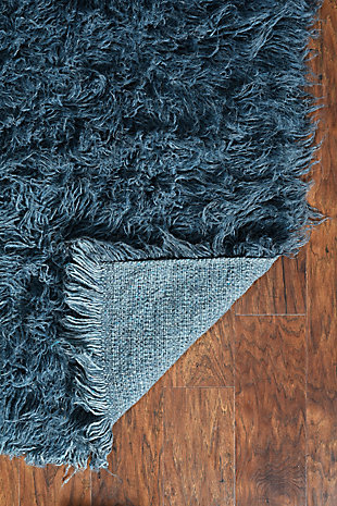 There is only one real Flokati, and still today, Flokati is one of the few products made the same way and in the same place as they were for centuries. Hand Woven in Greece of 100% New Zealand Wool the Original Flokati area rugs are a masterpiece for any home. Combining unique colorations with a truly unique construction, these pieces are a must have in any home looking for style, design and a classic piece of floor art.A rug pad is recommended because it has no substantial backing. A rug pad is recommended because it has no substantial backing.Imported | Hand Woven Shag | 100% Wool with a 100% Wool Open Woven Back | Vacuum regularly with suction only, disengage the beater bar.  Spot clean with damp cloth and mild detergent.  Rug can be washed in industrial Sized Machine with mild detergent such as Dreft.  Do NOT place in dryer, lay flat to dry, wool will then revert to curly nature and can be taken outside to shake and brished thru with a wide tooth vent style brush.  Professional cleaning recommended.