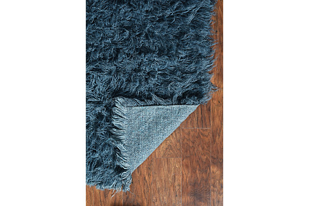 There is only one real Flokati, and still today, Flokati is one of the few products made the same way and in the same place as they were for centuries. Hand Woven in Greece of 100% New Zealand Wool the Original Flokati area rugs are a masterpiece for any home. Combining unique colorations with a truly unique construction, these pieces are a must have in any home looking for style, design and a classic piece of floor art.A rug pad is recommended because it has no substantial backing. A rug pad is recommended because it has no substantial backing.Imported | Hand Woven Shag | 100% Wool with a 100% Wool Open Woven Back | Vacuum regularly with suction only, disengage the beater bar.  Spot clean with damp cloth and mild detergent.  Rug can be washed in industrial Sized Machine with mild detergent such as Dreft.  Do NOT place in dryer, lay flat to dry, wool will then revert to curly nature and can be taken outside to shake and brished thru with a wide tooth vent style brush.  Professional cleaning recommended.