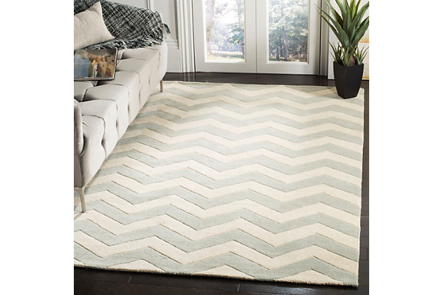 With its trendy chevron pattern, this Safavieh kids rug is buzzing with possibilities. Rest assured, it’s got a hand-tufted wool pile quality crafted for years of enjoyment and a cool, contemporary style they won’t soon outgrow.Made of wool | Hand-tufted | Rug pad recommended | Wool fibers are prone to shedding, vacuum regularly and shedding will subside | Imported | Spot clean/dry clean recommended