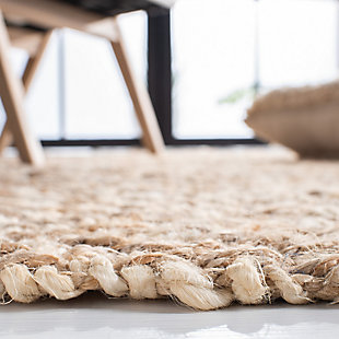 Think coastal living and casual beach house style with rugs so classic they'll even work in the city. Safavieh's natural fiber rugs are soft underfoot, textural, natural in color and woven of sustainably harvested sisal and sea grass, or biodegradable jute fibers twice-washed for unrivaled softness and beauty.Handwoven | Made of 100% jute pile | Imported