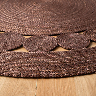 Think coastal living and casual beach house style with rugs so classic they'll even work in the city. Safavieh's natural fiber rugs are soft underfoot, textural, natural in color and woven of sustainably harvested sisal and sea grass, or biodegradable jute fibers twice-washed for unrivaled softness and beauty.Hand-loomed construction | Made of 100% jute pile | Imported
