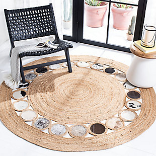 The Natural Fiber Rug Collection features an extensive selection of jute rugs, sisal rugs and other eco-friendly rugs made from innately soft and durable natural fiber yarns. Subtle, organic patterns are created by a dense sisal weave and accentuated in engaging colors and craft-inspired textures. Many designs made with non-slip or cotton backing for cushioned support. Handwoven | Made of 70% jute, 30% leather | Imported