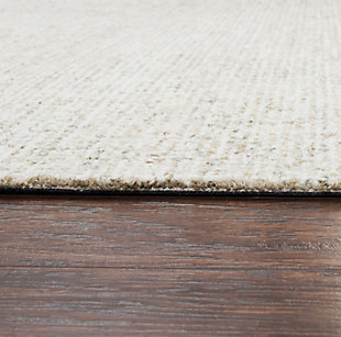 Soft color tones of richly died wools blend in harmony to create a sophisticated and subtle back drop to any room. By use of a unique dying process, multiple shades of color are achieved making decorating around this rug a simple and flawless process. Hand crafted in India, using 100% premium blended wool means the beautiful tones will be fade resistant and true to its color year after year. The london collection is constructed using an ultra-dense "looped" pile to create a finish that is suitable for high traffic areas with an easy care surface. Each work of art created by our team is done with meticulous attention to detail from start to finish, ensuring to deliver the finest in wool area rugs that will last the test of time.Wool | Hand-tufted | Ultra dense construction | Natural fiber | Unique texture | Imported