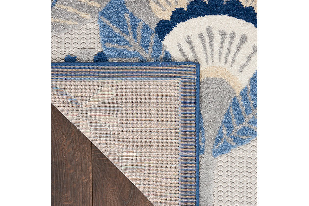 This sensational collection of flat-woven indoor/outdoor rugs is pretty, practical, and perfect for high-traffic areas. With its inviting assortment of modern design and terrific texture, this multipurpose rug will make a statement in any environment. Bold and exotic, this collection radiates a straightforward sophistication thanks to a contemporary and vivid color palette. This indoor/outdoor area rug from nourison is machine-made with premium stain-resistant fibers. Simply rinse and air dry. The splendid texture of this rug complements a patio, porch or poolside setting with ease.Made of 100% polypropylene for easy cleaning | Indoor/outdoor | Simply rinse and air dry | Machine made | Flat woven with raised, cut pile patterns for a delightful texture underfoot | Rug pad recommended | Colors may vary in appearance from sunlight to indoor lighting | Due to the detailed construction of our rugs, both handmade and machine-made, sizes may vary by up to three inches in width or length | Ideal for high traffic areas such as your living room, or outdoor spaces including your patio, porch or deck | Imported