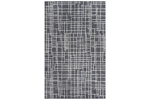 The Classic hand-tufted area rug is masterfully constructed by skilled weavers. With the look and feel of fine quality, this wool rug is ideal for a medium-size area and is a visually appealing addition to your decor. 100% Wool | Hand Tufted | Hand Serged  | Tone on Tone