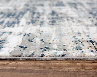 This power-loomed area rug adds a hint of luxury to your room and is ideal for a medium-size space. It features soft, neutral hues of ivory and gray with a splash of teal for contrast. This extra soft low pile rug looks like silk and has timeless appeal with its intricate design and elegant pattern. 100% Polyester | Extra Soft | Looks like Silk | Low Pile