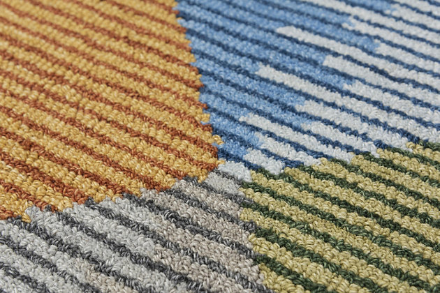 Part of the Addison collection, this medium-size area rug adds a stunning look and feel to any room. The rugs are hand-tufted using wool that has been spun with a unique process to make the yarn more smooth and crisp. It mixes a loop pile and a cut pile of different thicknesses to make the rug a truly unique work of art. Space dyed wool softens the look and takes it to a new dimension.100% Wool | Hand Tufted | Unique designs | Exclusive design
