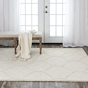 A masterpiece of great design, stunning color and skilled craftsmanship, this medium-size area rug is part of the Ava collection. Skilled artisans create works of art with tuft looped color fields of soft, solid colored wool and overlay crisp, geometric patterns. The design accents are hand sheared at a slightly taller height, creating 3-D effects that makes the designs literally jump out. 100% Wool | Hand Tufted | Unique designs | Exclusive design