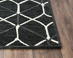A masterpiece of great design, stunning color and skilled craftsmanship, this medium-size area rug is part of the Ava collection. Skilled artisans create works of art with tuft looped color fields of soft, solid colored wool and overlay crisp, geometric patterns. The design accents are hand sheared at a slightly taller height, creating 3-D effects that makes the designs literally jump out. 100% Wool | Hand Tufted | Unique designs | Exclusive design