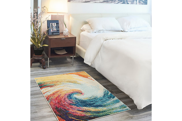 Spiraling waves of radiant color dazzle the eye in this exciting celestial collection area rug by nourison. The design hints at galaxies forming, and brings the beauty of the cosmos into the room in an artful impression of infinite mystery.Serged edges | Easy-care fibers | Cut pile | Machine made | Power-loomed | Low shedding | Recommended for areas with moderate foot traffic | Indoor only | 100% polypropylene | Imported