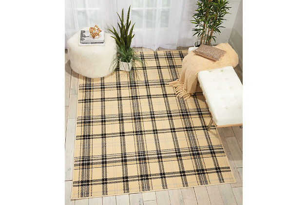 A perfect plaid design is especially eye-catching when presented in cosmopolitan shades of cream and black. Expertly power-loomed from from fabulously textured polypropylene, this entrancing grafix area rug from nourison will artfully accentuate any room.Serged edges | Easy-care fibers | Cut pile | Machine made | Power-loomed | Low shedding | Recommended for areas with moderate foot traffic | Indoor only | 100% polypropylene | Imported