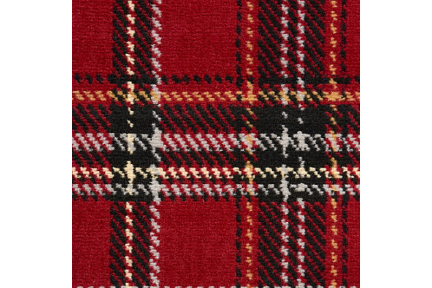A perfect plaid design is especially eye-catching when presented in compelling shades of red, cream, black, and blue. Expertly power-loomed from fabulously textured polypropylene, this entrancing grafix area rug from nourison will artfully accentuate any room.Serged edges | Easy-care fibers | Cut pile | Machine made | Power-loomed | Low shedding | Recommended for areas with moderate foot traffic | Indoor only | 100% polypropylene | Imported