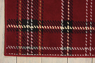 A perfect plaid design is especially eye-catching when presented in compelling shades of red, cream, black, and blue. Expertly power-loomed from fabulously textured polypropylene, this entrancing grafix area rug from nourison will artfully accentuate any room.Serged edges | Easy-care fibers | Cut pile | Machine made | Power-loomed | Low shedding | Recommended for areas with moderate foot traffic | Indoor only | 100% polypropylene | Imported