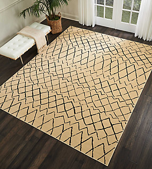 Playful and primitive, this grafix area rug from nourison features distressed black tribal rug patterns on a luxurious cream field. Each rug is power-loomed for simple care, superior wear, and a splendid look and feel, and will transform even the most ordinary room into something extraordinary.Serged edges | Easy-care fibers | Cut pile | Machine made | Power-loomed | Low shedding | Recommended for areas with moderate foot traffic | Indoor only | 100% polypropylene | Imported